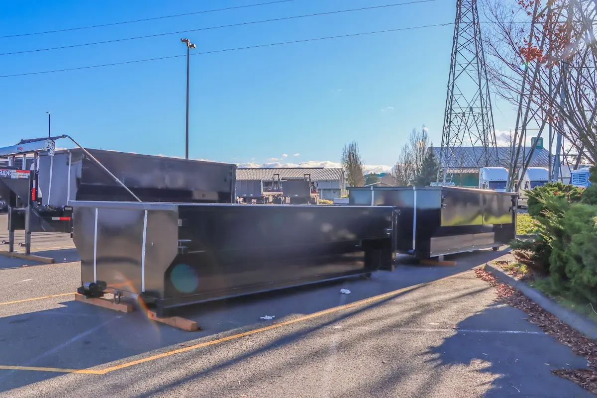 Roll-off dumpster ready for waste disposal at job site for Construction Dumpster Rental in Durham